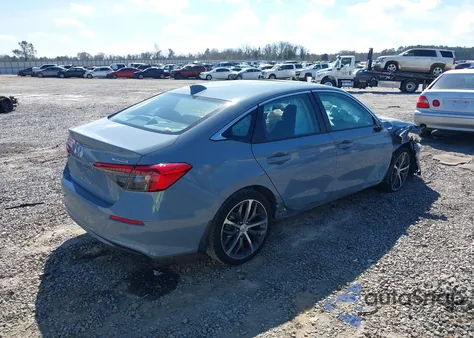 2023 Honda Civic Touring z USA, uszkodzony, nr VIN 2HGFE1F94PH308397